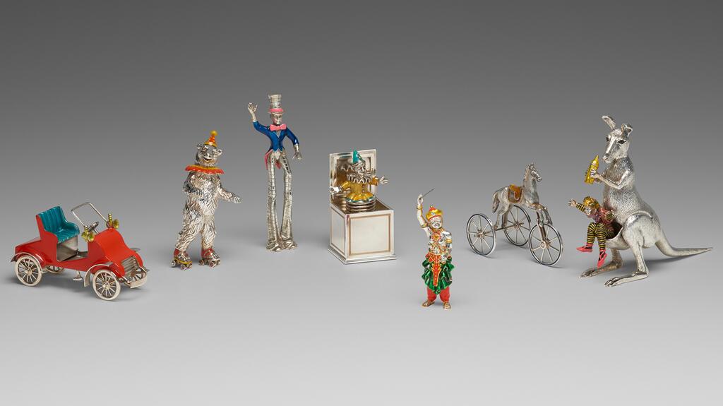These colorful characters make up one of several sets of figurines that hit the auction block. 20220210_6-Gene Moore.jpg